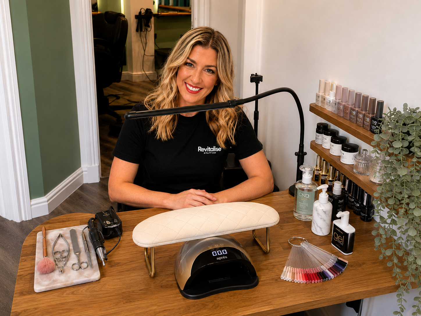 Anna providing nail services at Revitalise